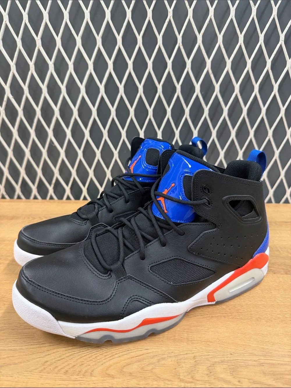 Jordan High-Top Sneakers in Black with Blue and Red Accents